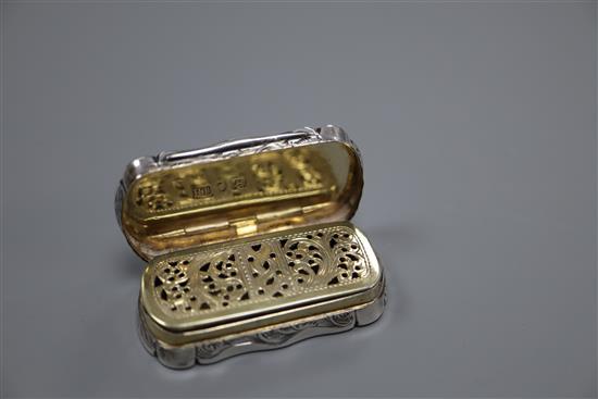 A Victorian engraved rounded rectangular silver vinaigrette, Robert Thornton, Birmingham, 1870, 50mm.